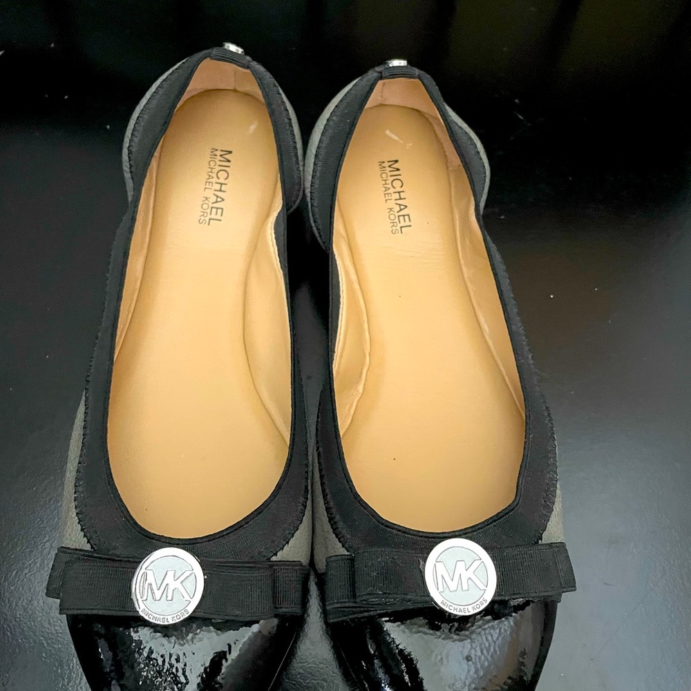 Michael Kors Dixie Leather Ballet Flats in black and gray.